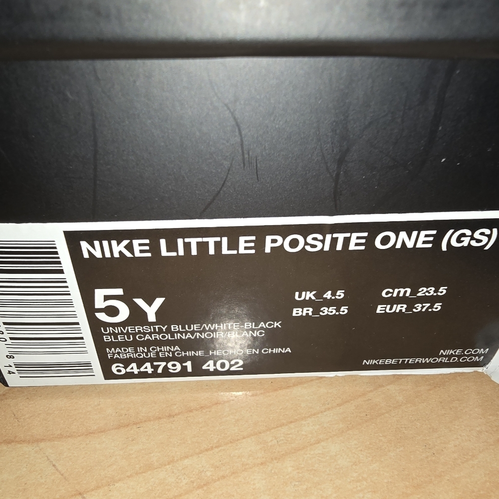 Nike Blue and Black Sneakers with Ribbed Design and Futuristic Look - Picture 3 of 3